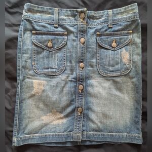bebe Distressed Button-Front Denim Mini Skirt in Blue